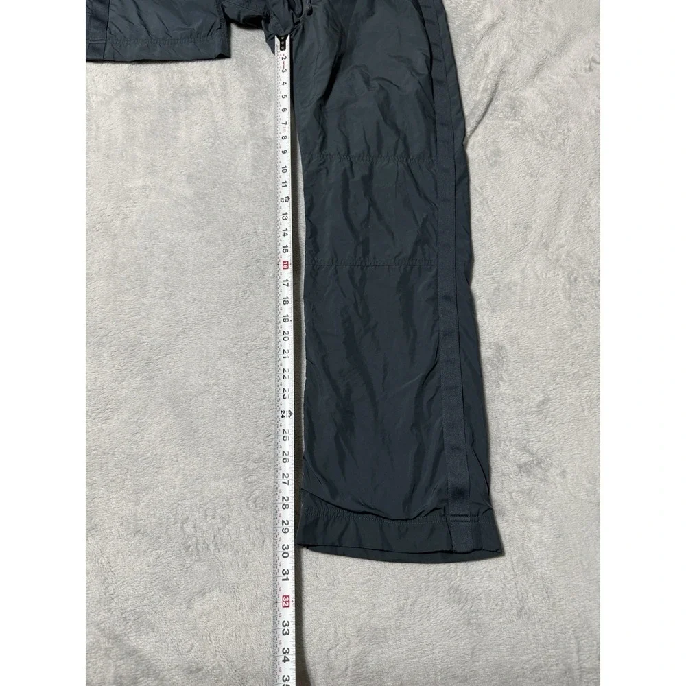 VTG Nike Womens Medium Track Pants Windbreaker Green Polyester 29x30